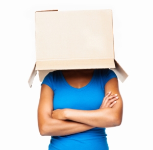 Woman With Brown Box On Her Head - Isolated